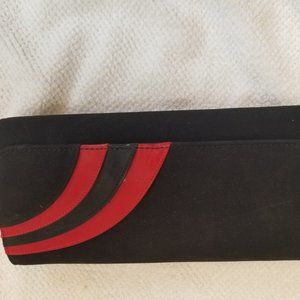 Black all leather suede clutch.